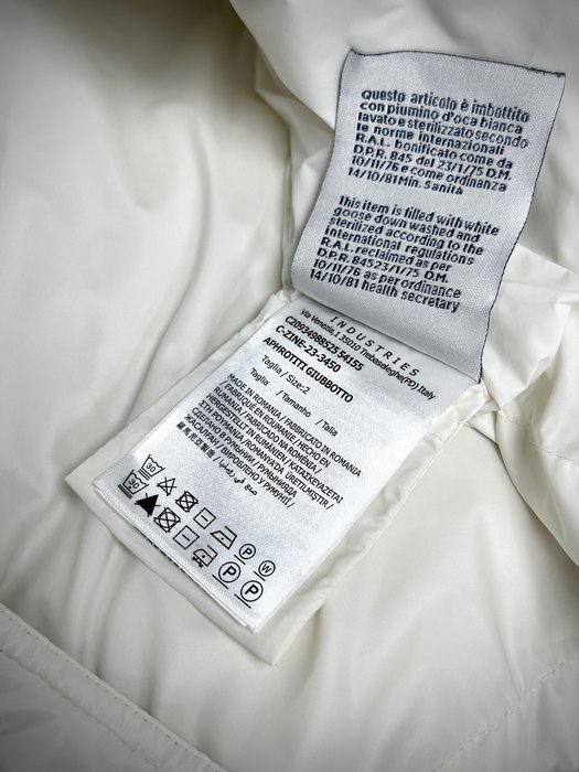 Clothing Moncler down jacket with fur hood White