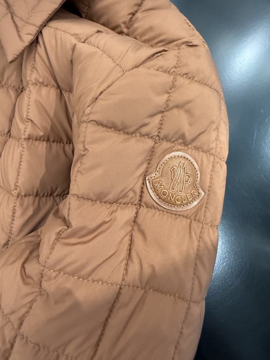 Clothing Moncler quilted jacket Brown