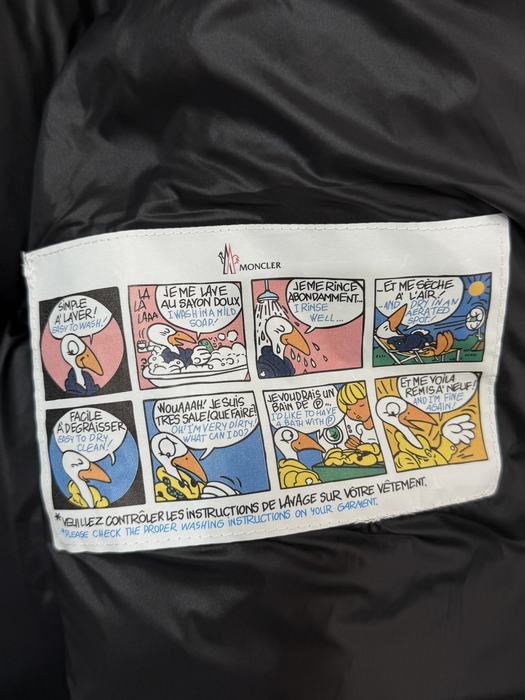 Clothing puffer jacket with shearling detail Black