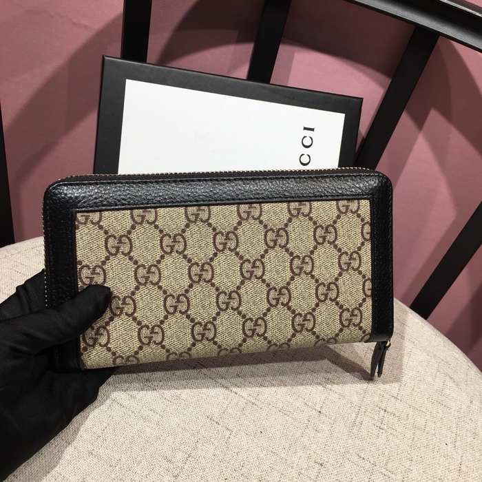 Clutch bag Gucci GG canvas zip around Brown Size 19x10cm
