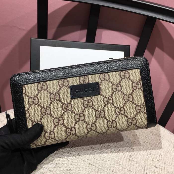 Clutch bag Gucci GG canvas zip around Brown Size 19x10cm