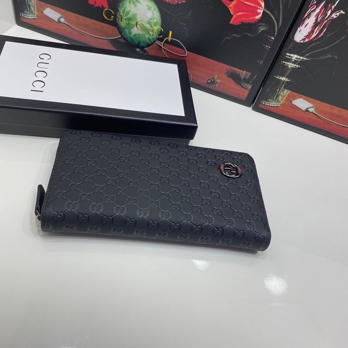 Clutch bag Gucci zip around embossed leather wallet Black Size 19x10cm