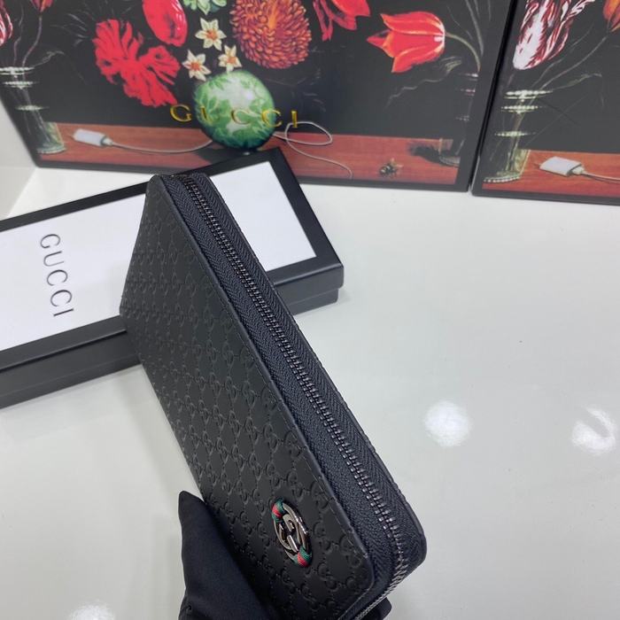 Clutch bag Gucci zip around embossed leather wallet Black Size 19x10cm