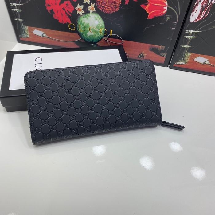 Clutch bag Gucci zip around embossed leather wallet Black Size 19x10cm