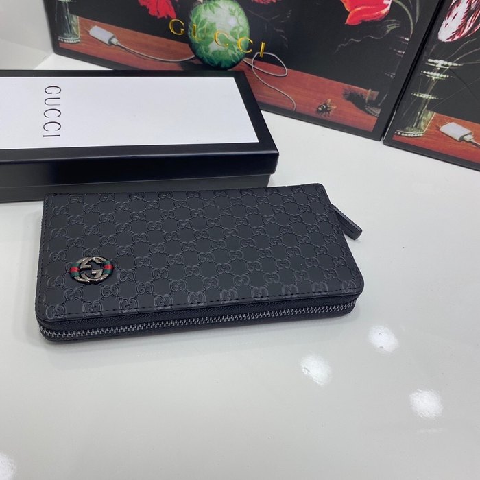 Clutch bag Gucci zip around embossed leather wallet Black Size 19x10cm