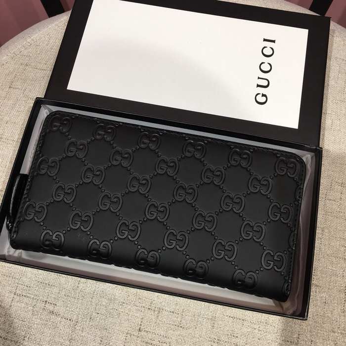 Clutch bag Gucci zip around embossed leather Black Size 19x10cm 001