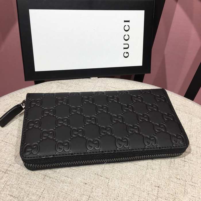 Clutch bag Gucci zip around embossed leather Black Size 19x10cm 001