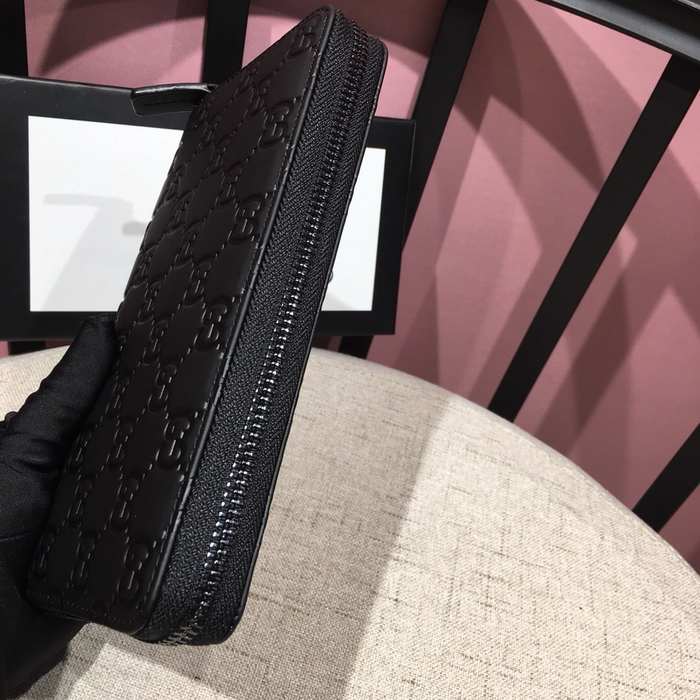 Clutch bag Gucci zip around embossed leather Black Size 19x10cm 001