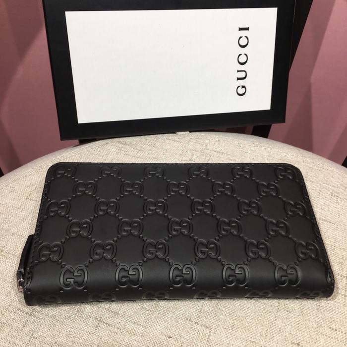 Clutch bag Gucci zip around embossed leather Black Size 19x10cm 001