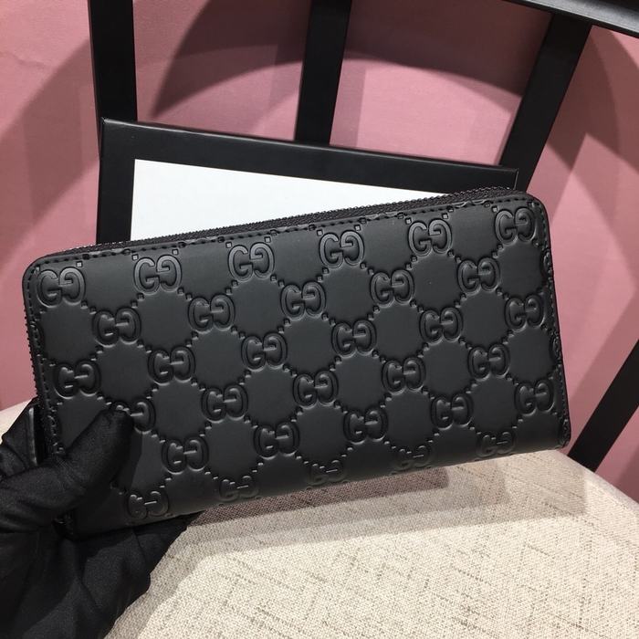 Clutch bag Gucci zip around embossed leather Black Size 19x10cm 001