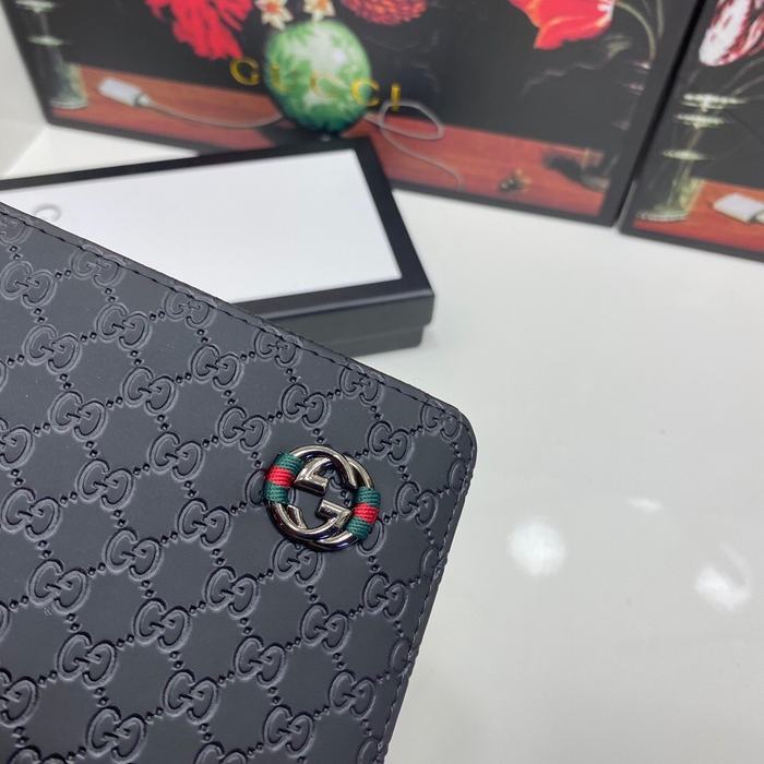 Clutch bag Gucci zip around embossed leather Black Size 19x10cm