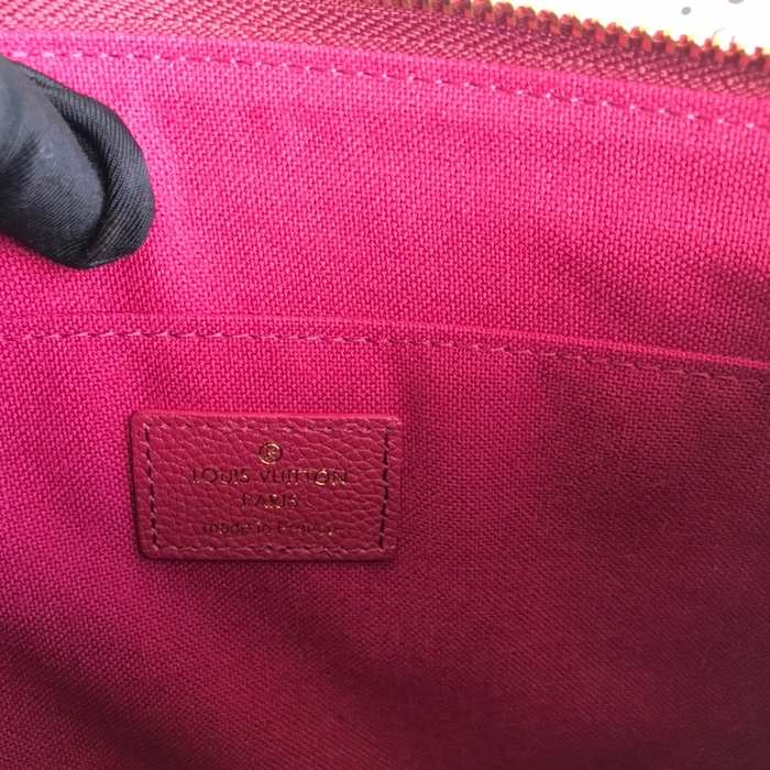 Clutch bag Louis Vuitton Monogram Empreinte Burgundy Size 29.5x21