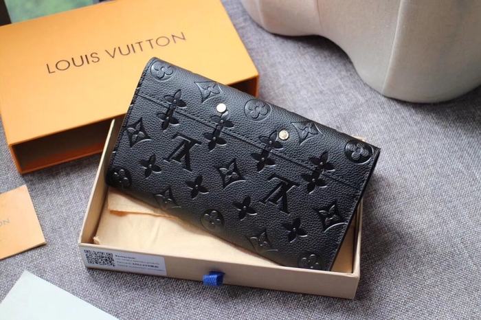 Wallet Louis Vuitton embossed monogram long wallet Black Size 19x10.5x2.5cm