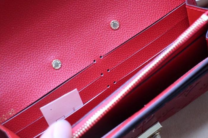 Wallet Louis Vuitton long embossed monogram wallet Red Size 19x10.5x2.5cm