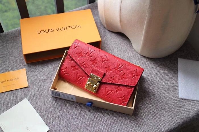Wallet Louis Vuitton long embossed monogram wallet Red Size 19x10.5x2.5cm