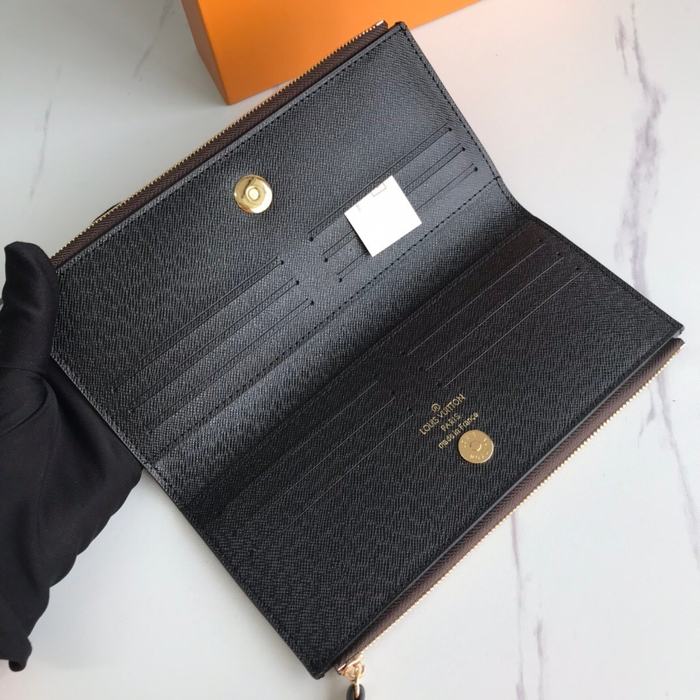 Wallet Louis Vuitton zippered long wallet Brown Size 21x9x2cm